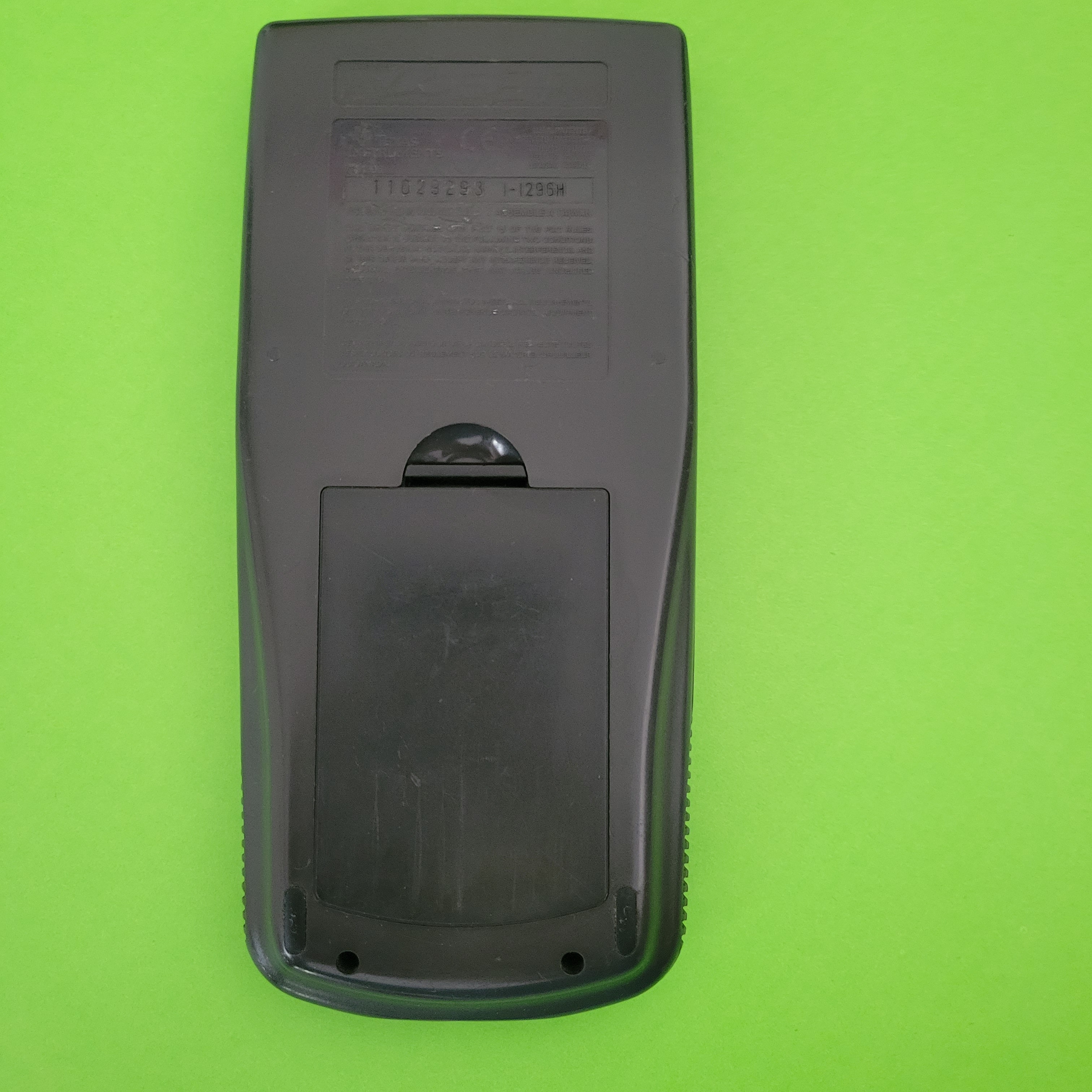 An image of the back of a texas instruments ti83 graphing calculator